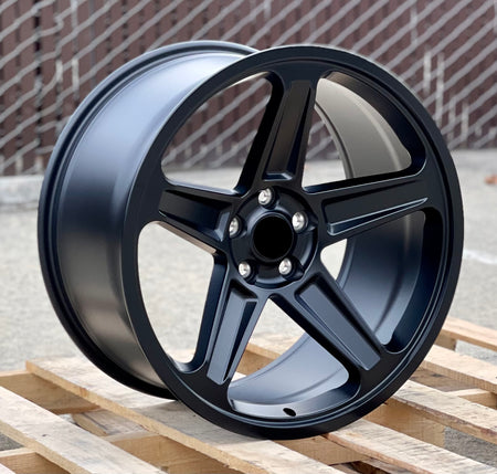 20-inch Demon Style concave wheels by OE Style Wheels on a Dodge Challenger or Charger, showcasing bold automotive rims.