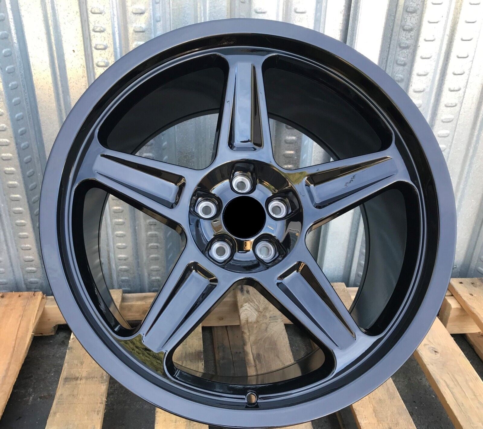 20-inch gloss black Demon Style wheels by OE Style Wheels on Dodge Challenger and Charger models, showcasing sleek automotive rims.