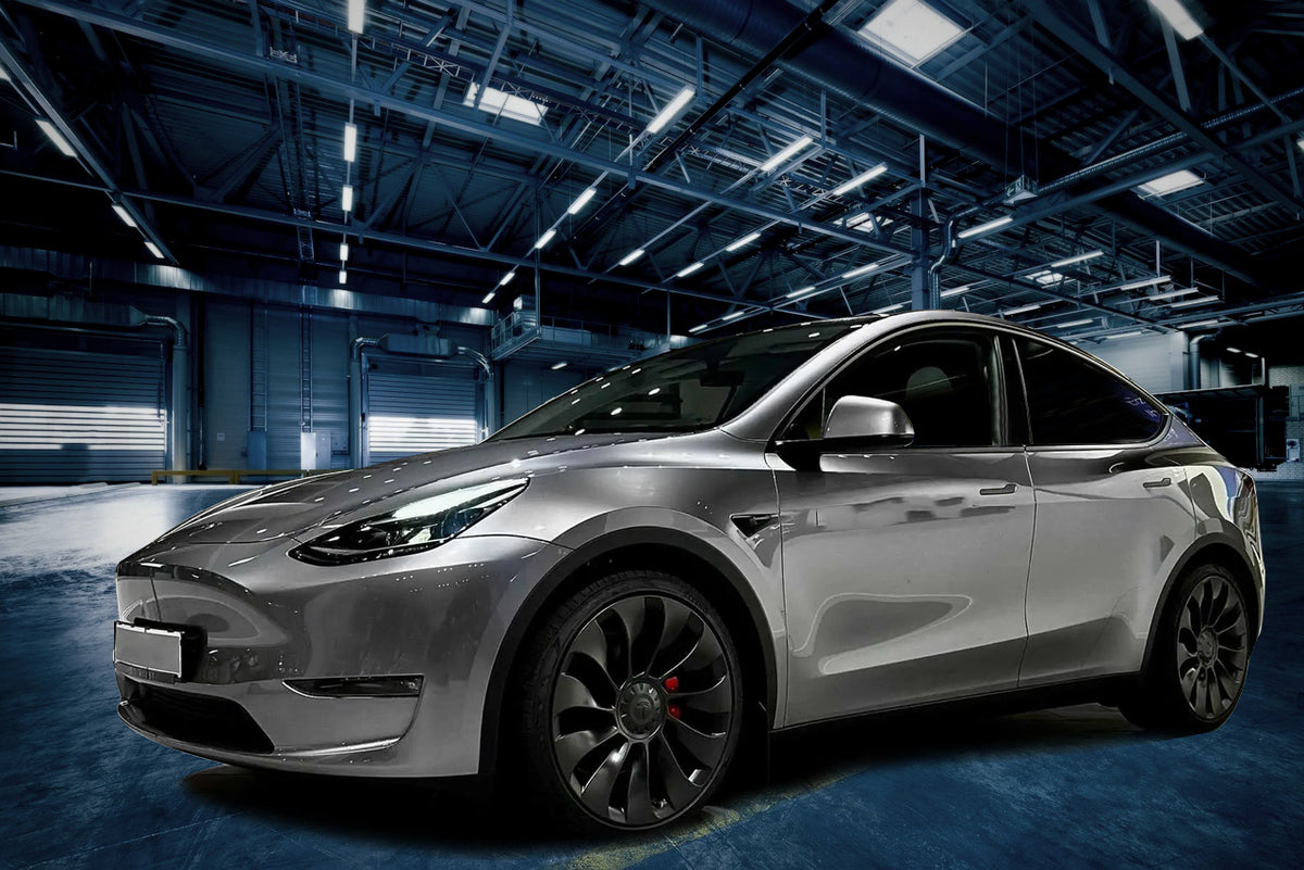 20-inch Überturbine Style matte black wheels by OE Style Wheels for Tesla Model 3 and Y, showcasing sleek, modern automotive rims.