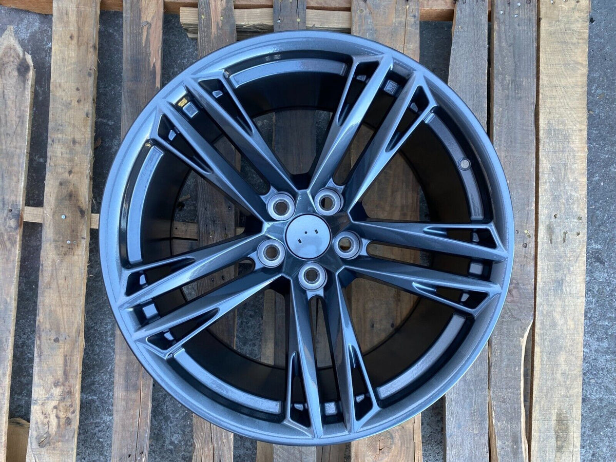 20-inch ZL1 style gun metal wheels by OE Style Wheels fitted on a Chevy Camaro ZL1 SS LT, showcasing sleek automotive rims.