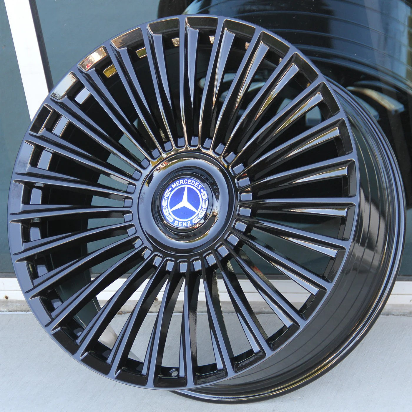 22-inch gloss black OE Style Wheels with multiple spokes for Mercedes CLS, S, GLE, GLS, AMG, and Maybach vehicles.