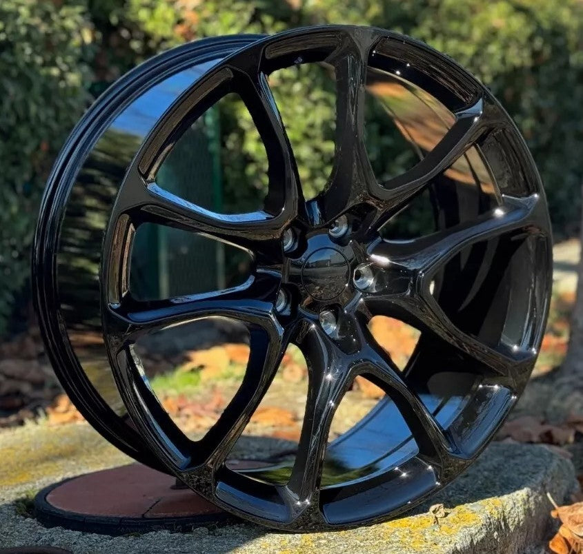 22-inch Hellcat style gloss black wheels by OE Style Wheels for Dodge Durango and Jeep Grand Cherokee, featuring bold automotive rim design.