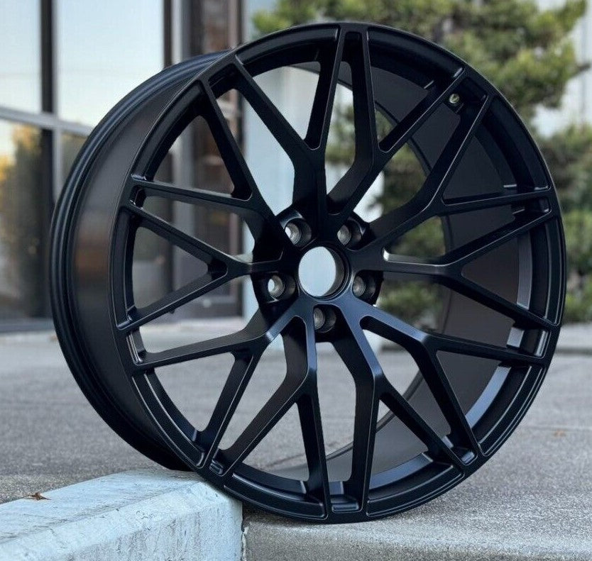 21-inch RS Spyder style matte black wheels by OE Style Wheels on a Porsche Macan, showcasing their sleek, sporty design.
