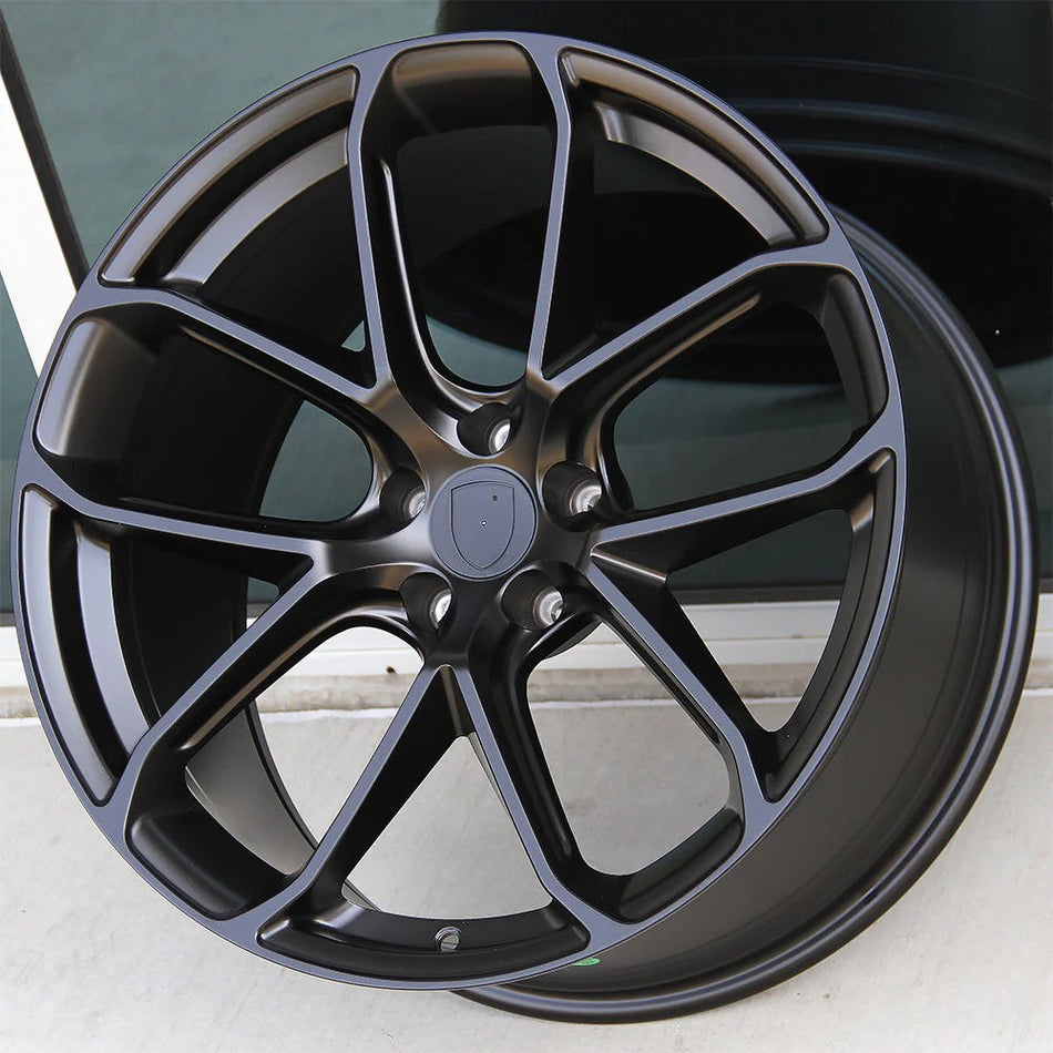 21-inch Turbo Style matte black wheels by OE Style Wheels on a Porsche Macan, showcasing sleek, sporty alloy rims.