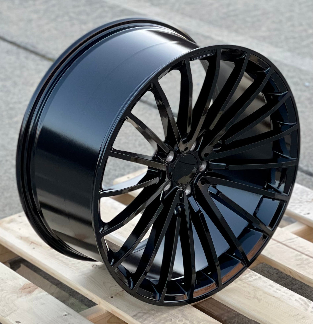 20-inch AMG style gloss black wheels from OE Style Wheels fitting Mercedes-Benz C-Class, E-Class, S-Class, CLS, and Maybach models.