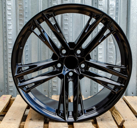 20-inch ZL1 style gloss black wheels by OE Style Wheels fitting Chevy Camaro ZL1 SS LT, showcasing sleek automotive rims.