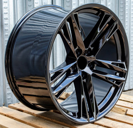 20-inch ZL1 style gloss black wheels by OE Style Wheels for Chevrolet Camaro ZL1 SS LT, featuring a sleek, sporty design.