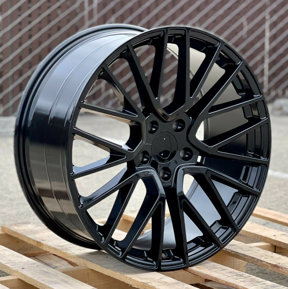 Gloss black 22-inch staggered GTS coupe style wheels by OE Style Wheels on a Porsche Cayenne GTS and Panamera GTS hybrid.
