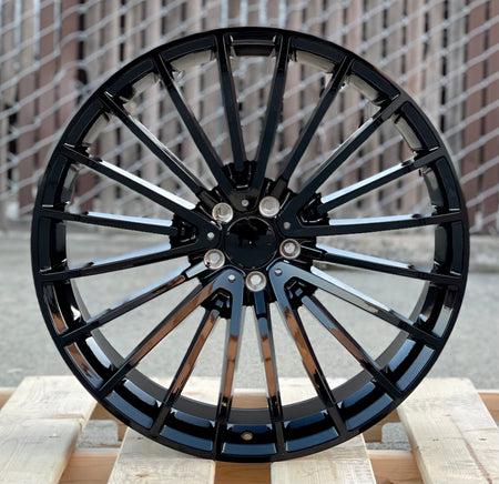 22-inch AMG style gloss black wheels by OE Style Wheels, designed for Mercedes CLS, S, GLE, GLS models, showcasing sleek automotive rims.