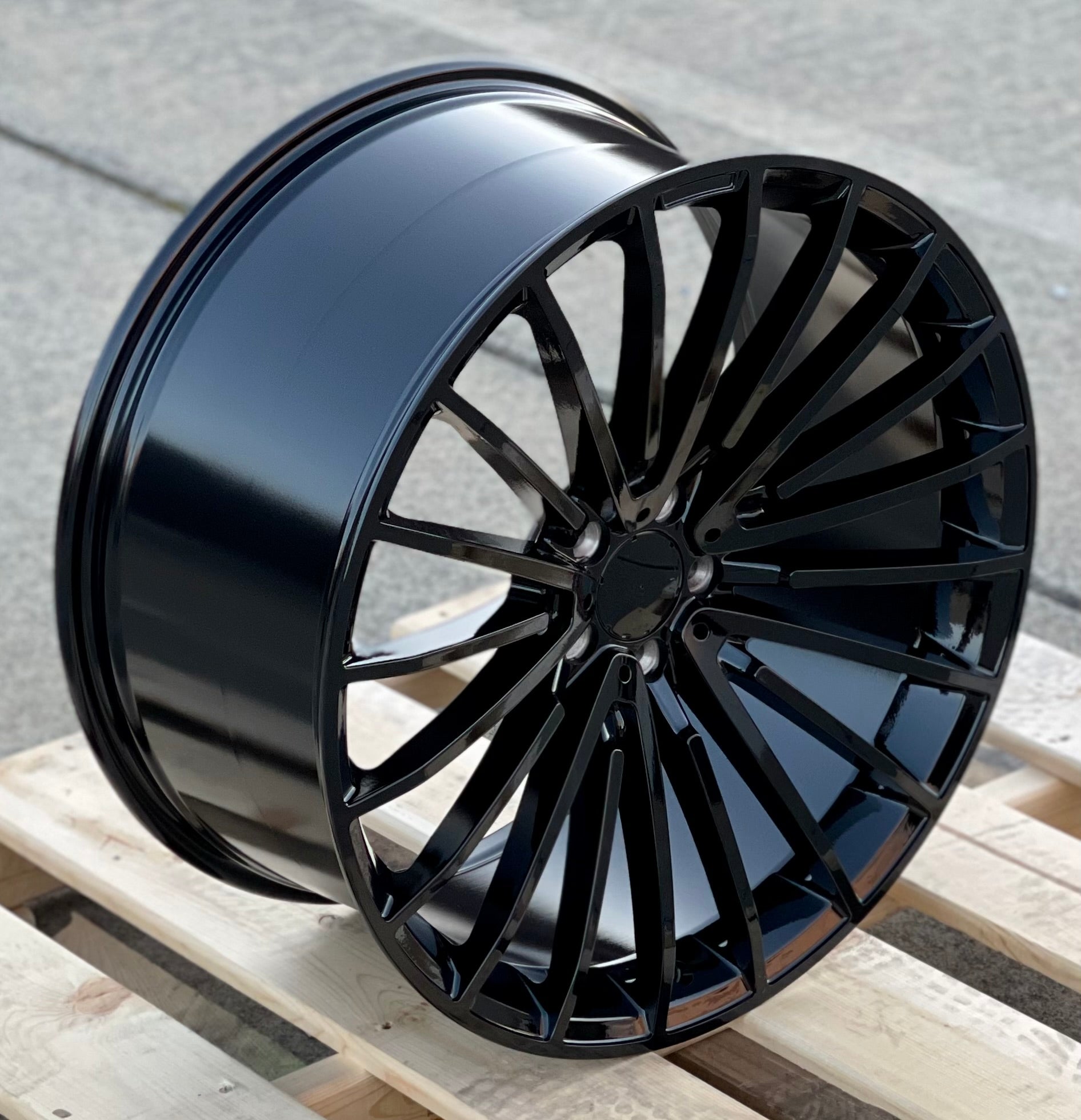 22-inch AMG Style gloss black wheels by OE Style Wheels for Mercedes CLS, S, GLE, and GLS models.