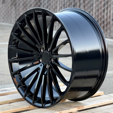 22-inch AMG style gloss black wheels by OE Style Wheels on a Mercedes CLS, S, GLE, GLS showcasing sleek automotive rims