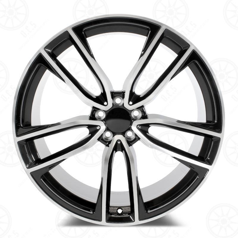 22-inch black machined face Mercedes wheels by OE Style Wheels on a vehicle, showcasing sleek automotive rims and wheel design.