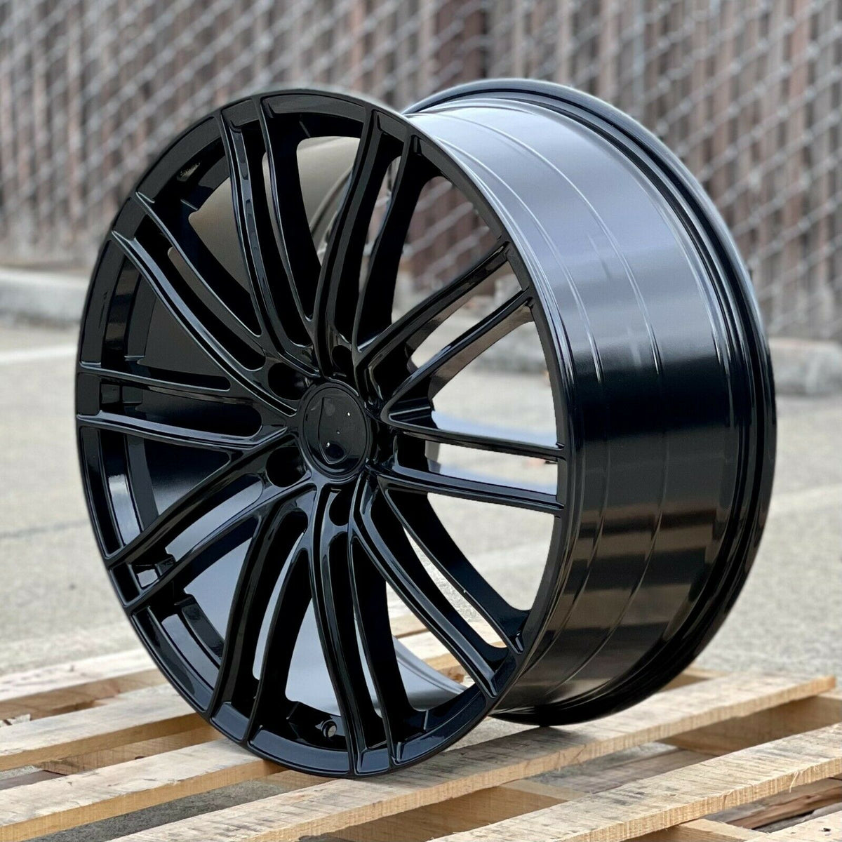 22-inch GTS style gloss black wheels by OE Style Wheels for Porsche Cayenne GTS, Diesel, Hybrid, and Turbo models.