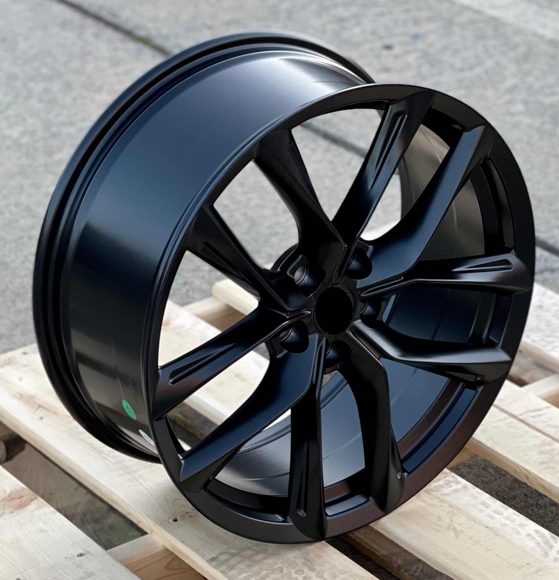 22-inch matte black OE Style Wheels for Tesla Model S and X, showcasing stylish automotive rims with a sleek finish.