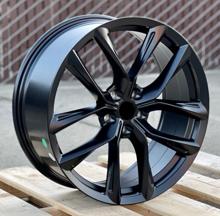 22-inch matte black OE Style Wheels for Tesla Model S and X, showcasing sleek automotive rims with a modern finish.