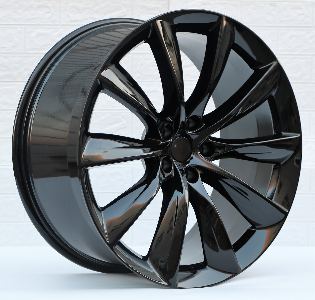22-inch gloss black turbine-style wheels by OE Style Wheels, designed for Tesla Model Y AWD, RWD, Long Range, and Performance.