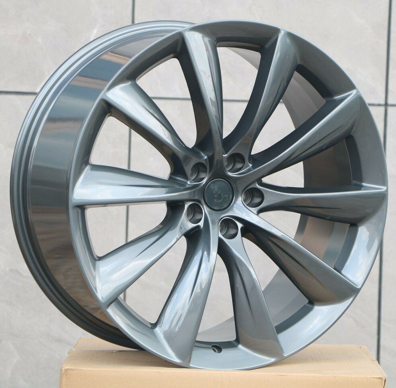 22-inch gunmetal turbine style wheels by OE Style Wheels for Tesla Model S and X, showcasing sleek automotive rims with a modern design.