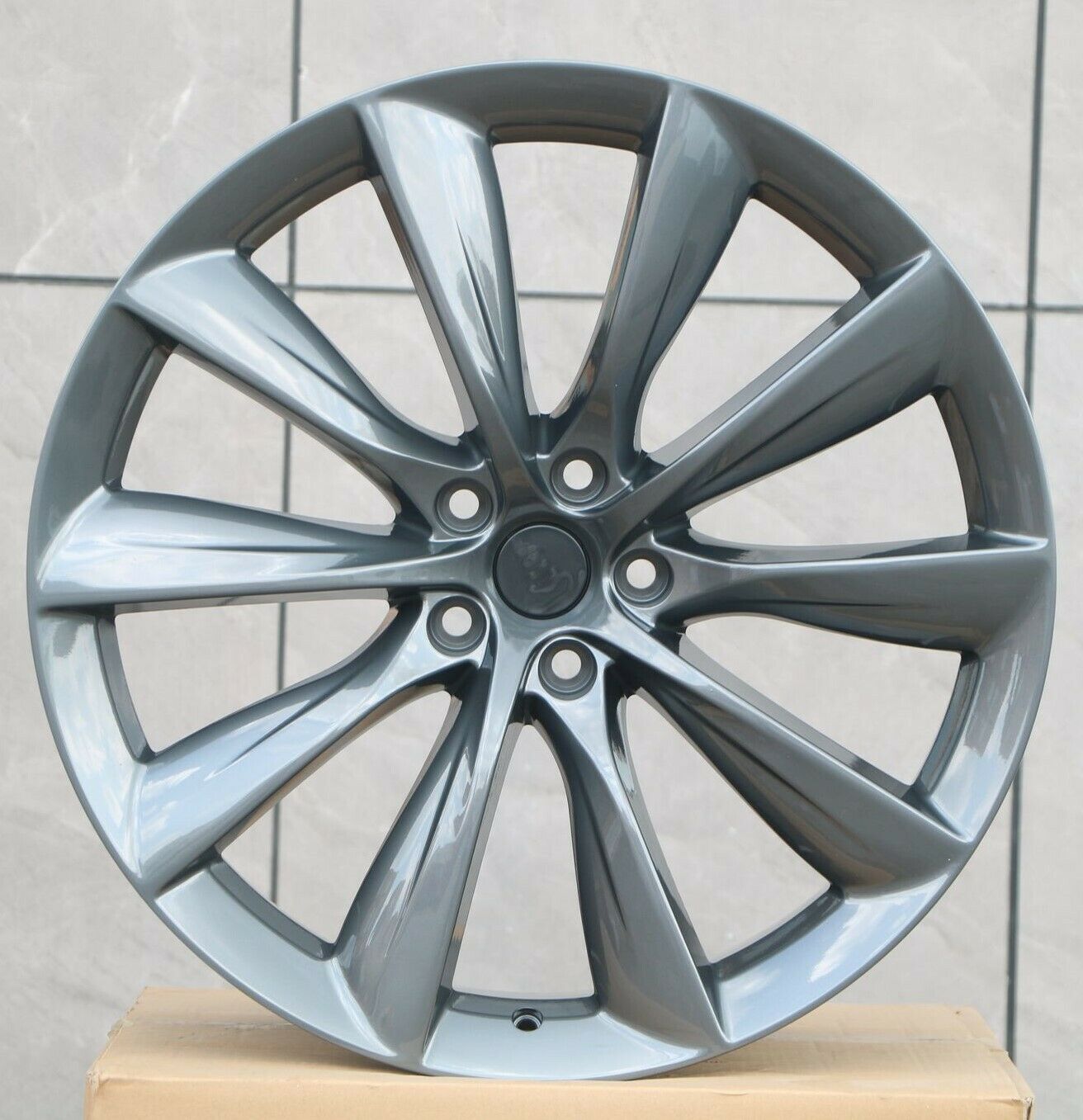 22-inch gunmetal turbine style wheels by OE Style Wheels for Tesla Model S and X, showcasing the sleek automotive rim design.