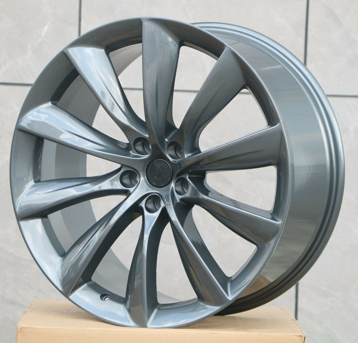 22-inch gunmetal turbine-style wheels for Tesla Model S and X from OE Style Wheels, showcasing the sleek design and fitment details.