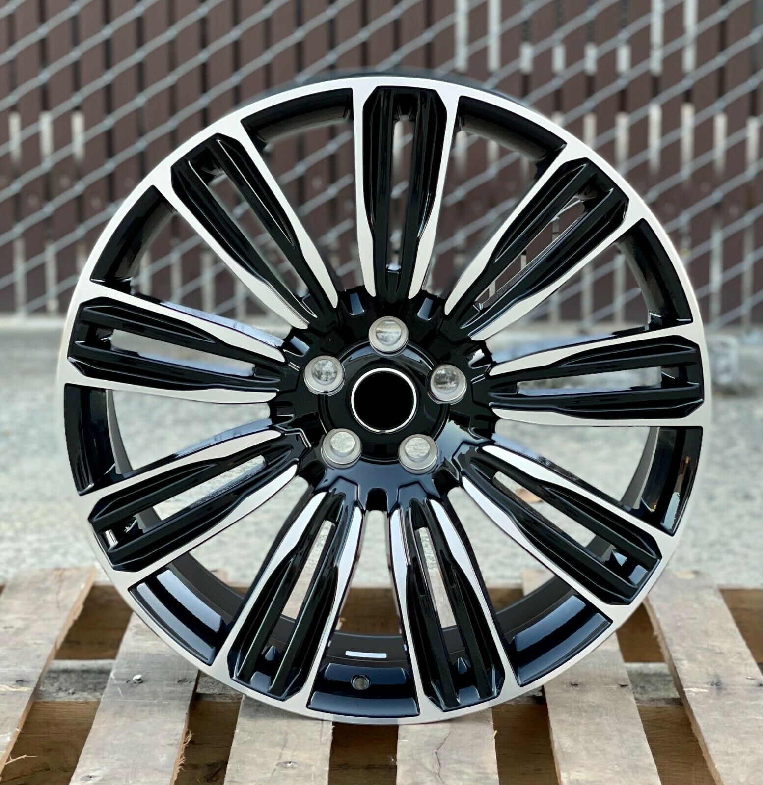 24-inch OE Style Wheels in black machined finish, designed for Range Rover Evoque and Velar models, showcasing sleek automotive rims.
